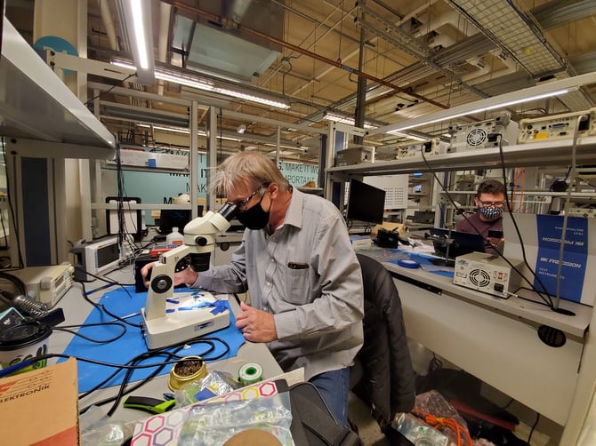 Man using microscope