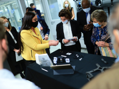 Women in 3D printing lab mHUB